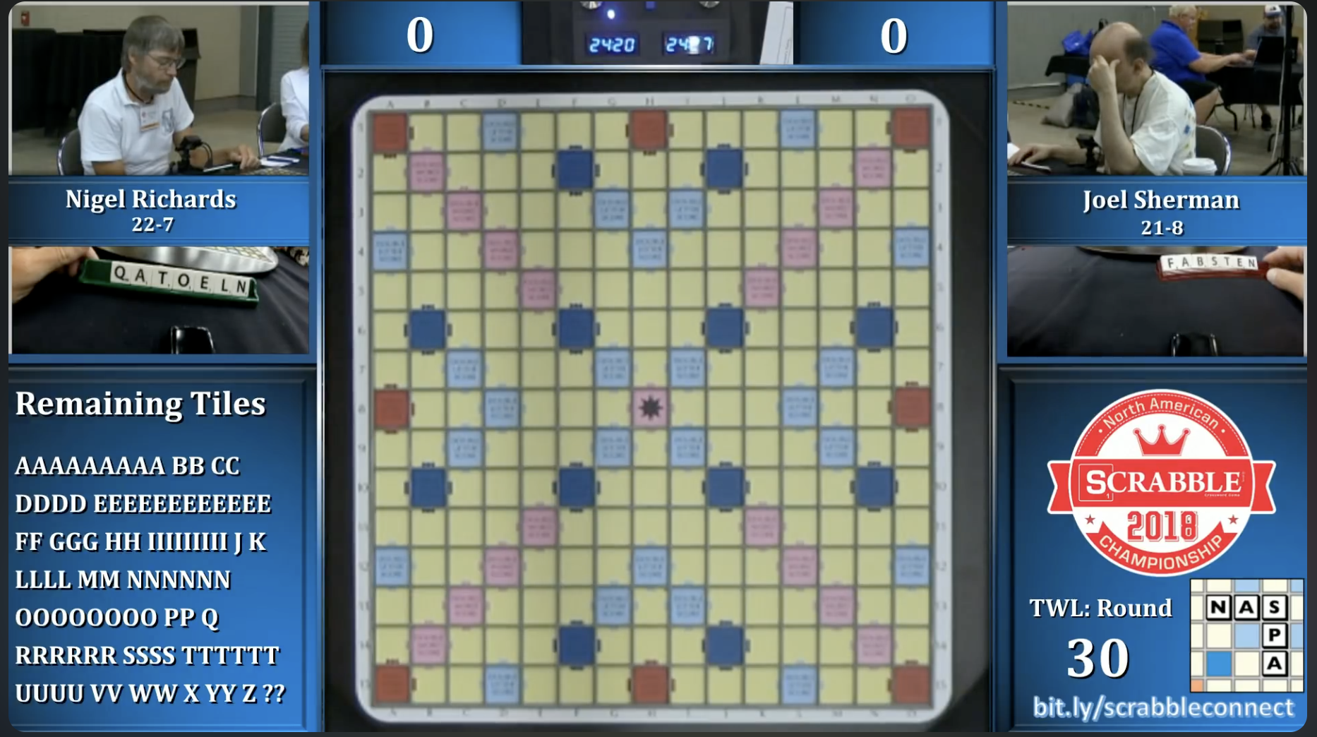 Scrabble board tiles showing the AELNOQT rack and a game in progress